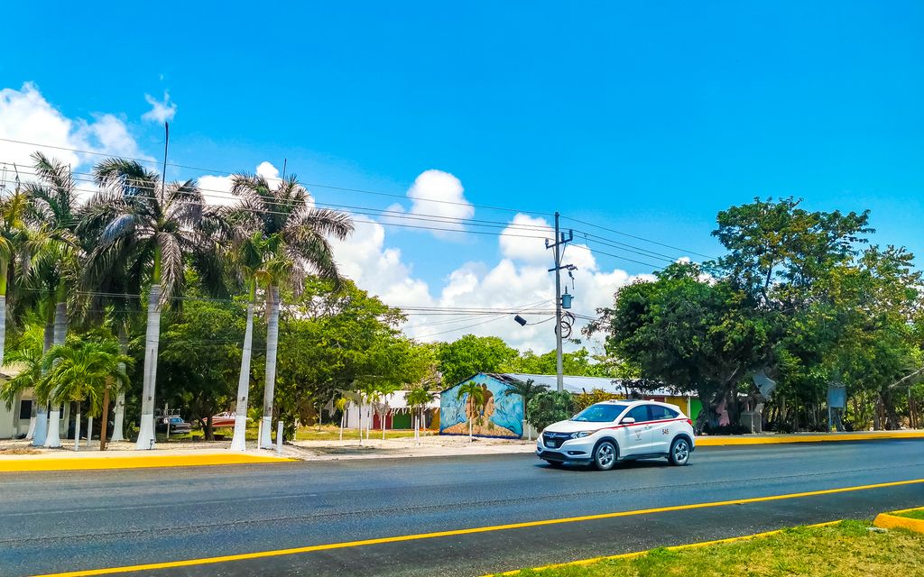 A car on the road in Playa del Carmen, Yucatan, Mexico